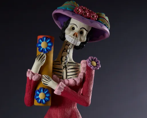 Image Credit: Calaca figurine. Â© Field Museum, Michelle Kuo.
